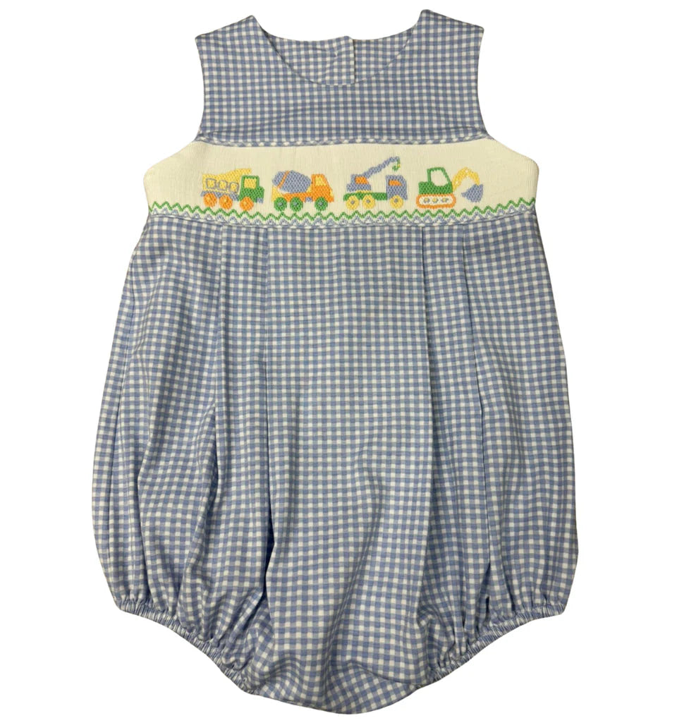 Baby romper with blue checkered pattern and train design on a white background