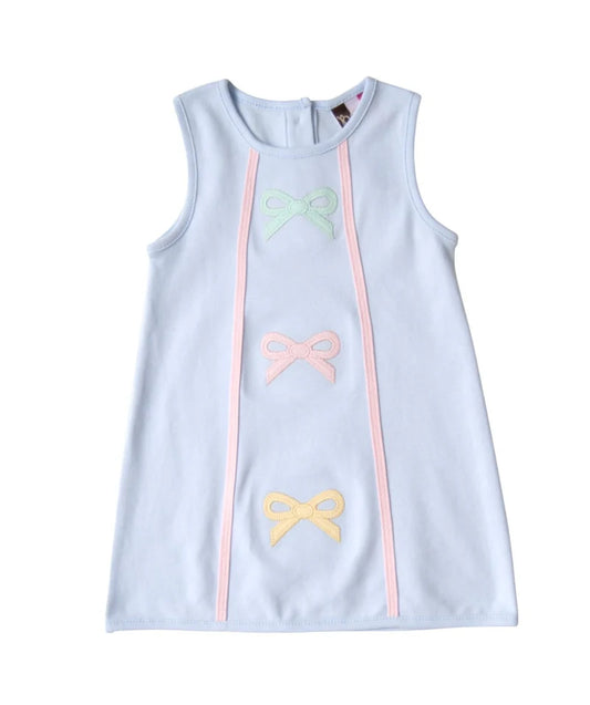 Light blue sleeveless dress with colorful bow accents on a white background