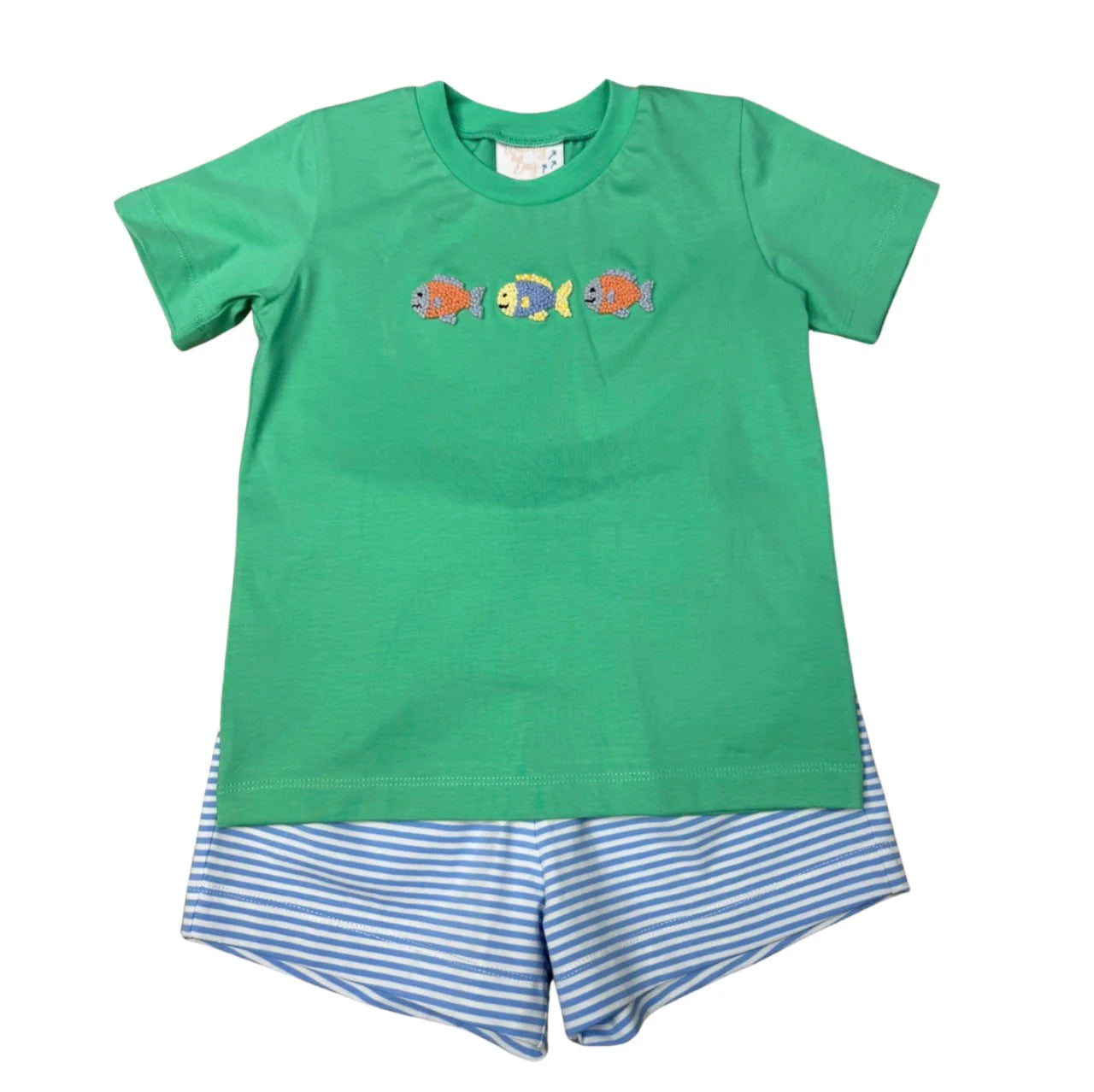 Green t-shirt with fish design and blue striped shorts on a white background