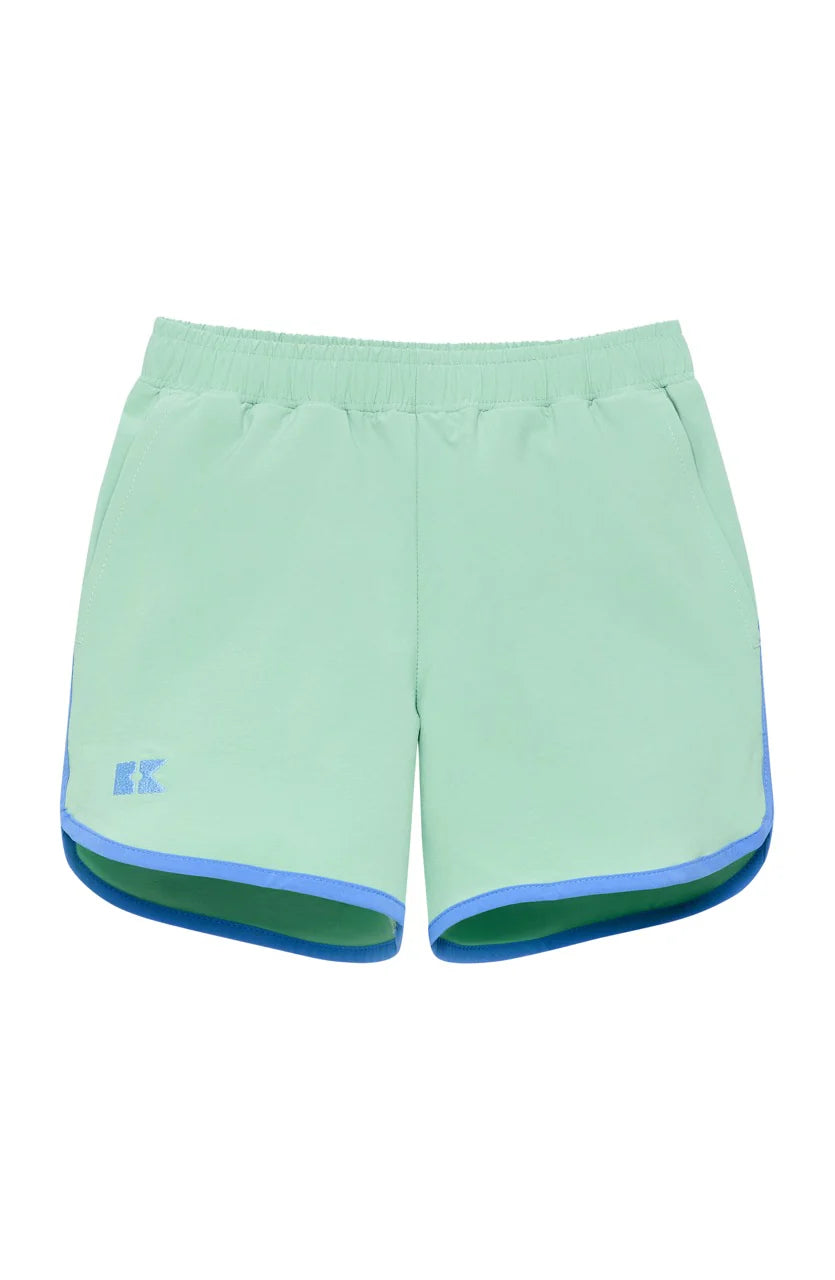 Light green shorts with blue accents on a white background