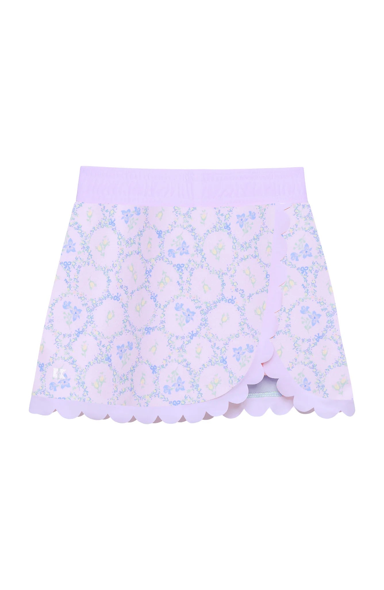 Floral patterned skirt with scalloped edge on a white background