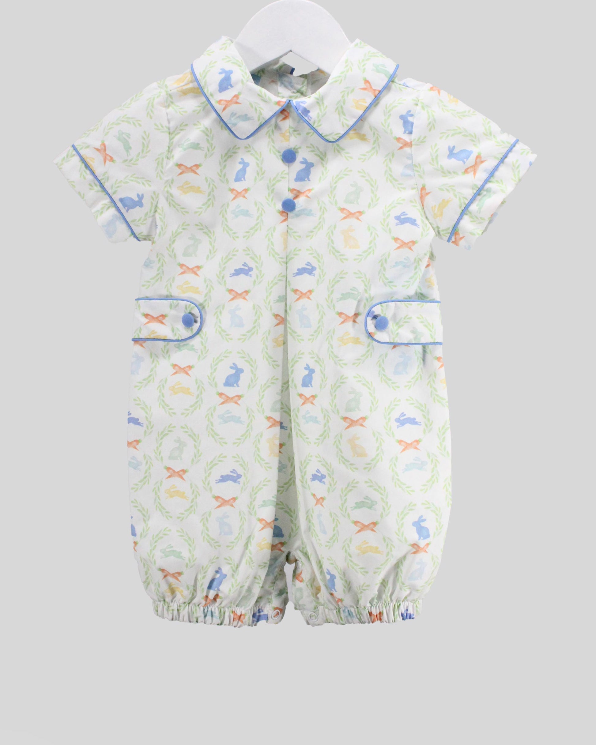 Baby romper with bunny pattern on a white background