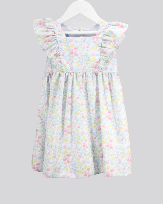 Children's dress with a floral pattern on a white hanger against a gray background