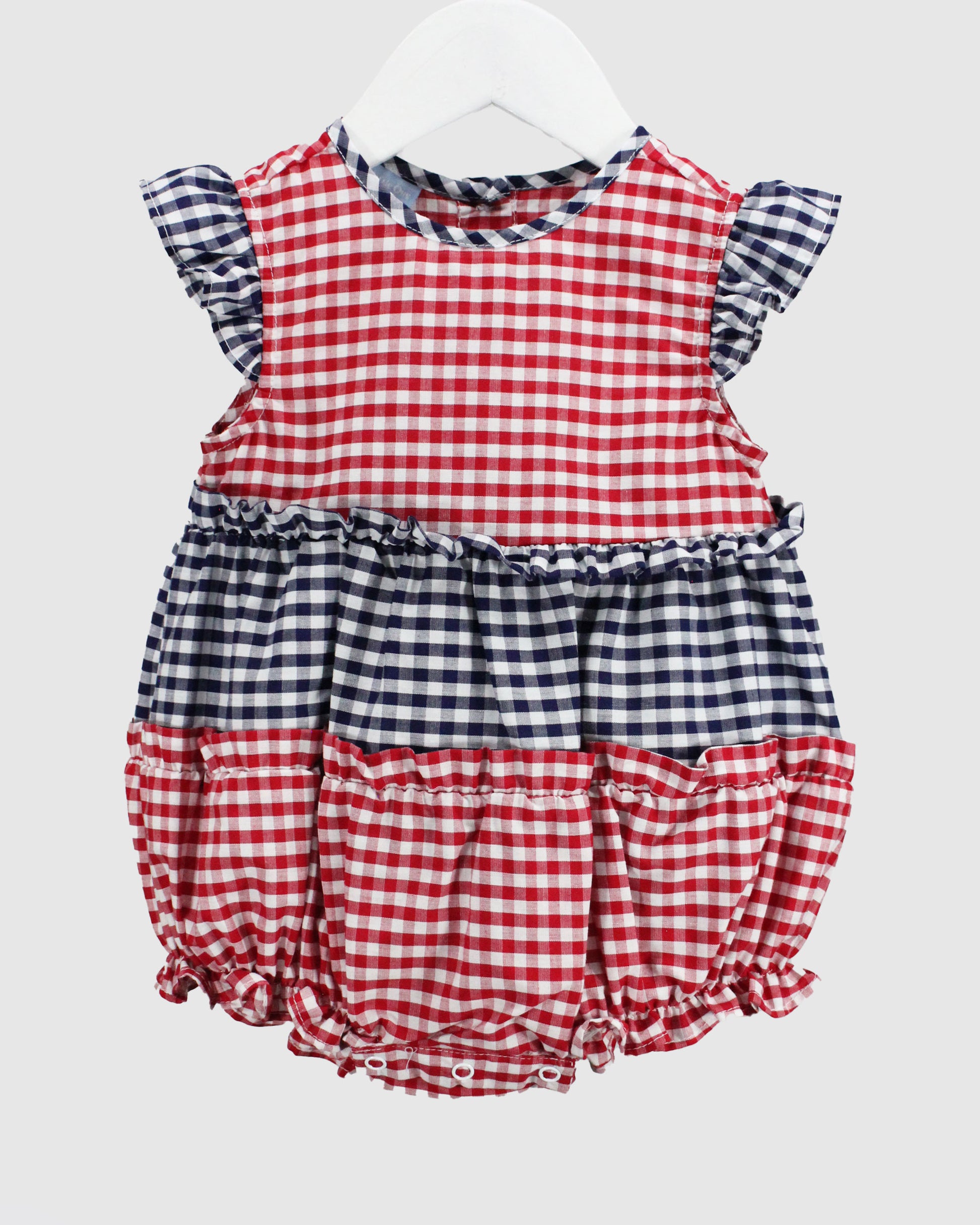Red and blue checkered baby romper on a white background