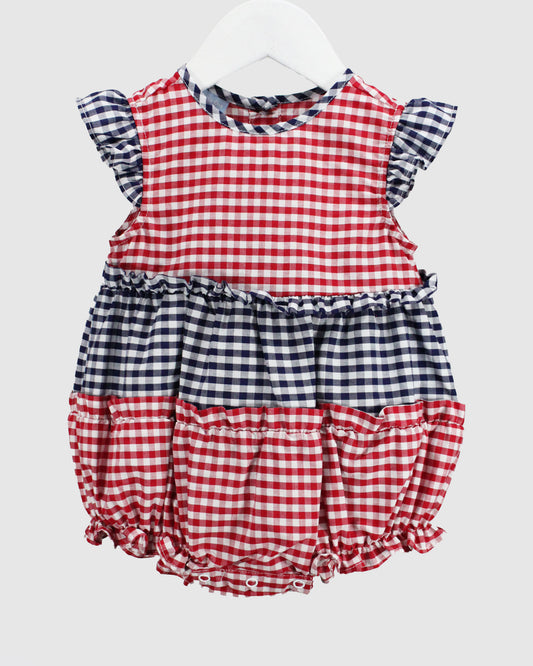 Red and blue checkered baby romper on a white background