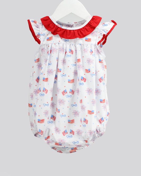 Baby romper with American flag pattern on a gray background