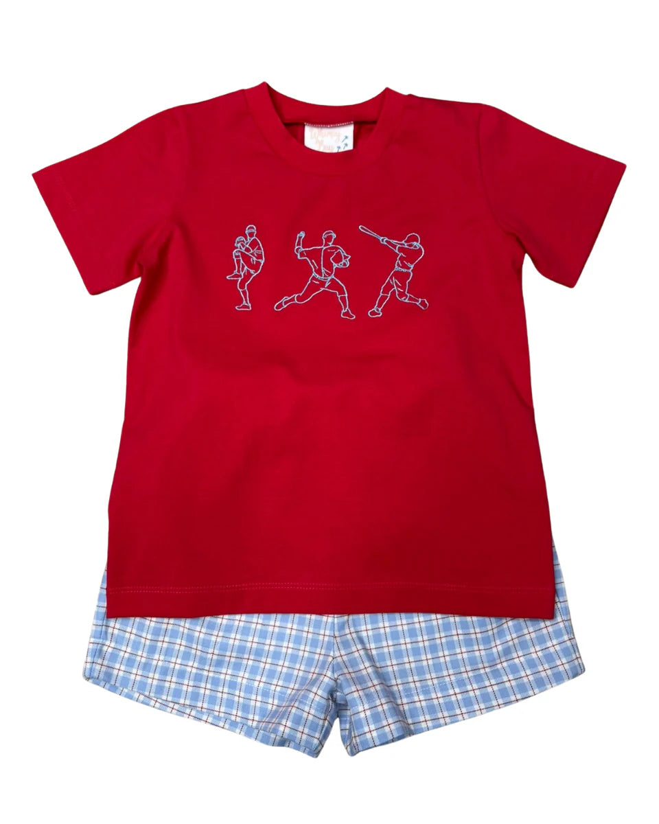 Red t-shirt with graphic design and checkered shorts on a white background