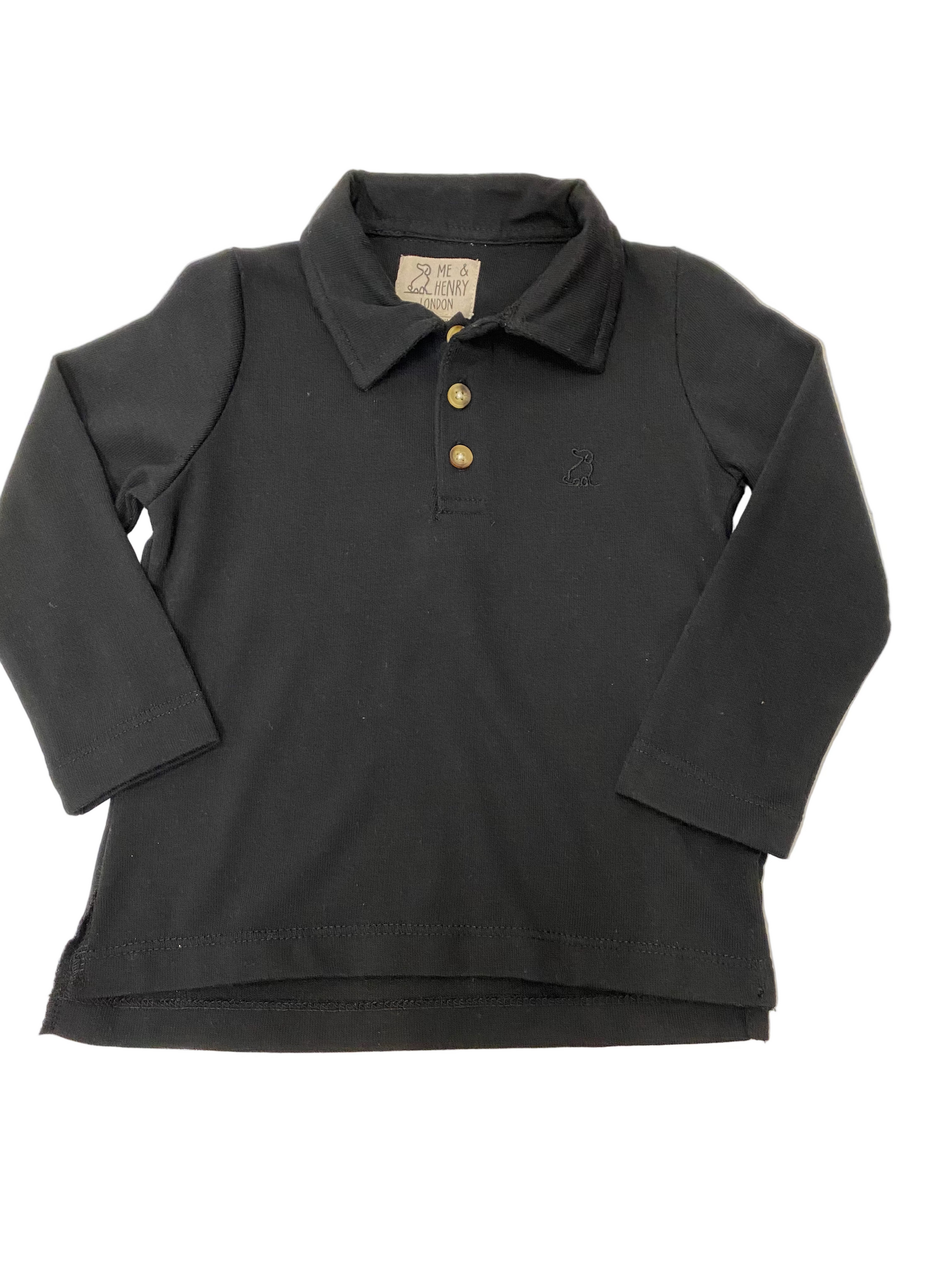 Black long-sleeve polo shirt on a white surface