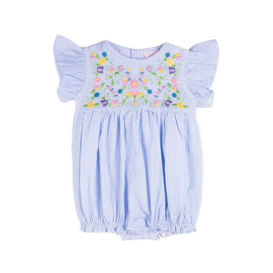Baby romper with floral smocking on a white background