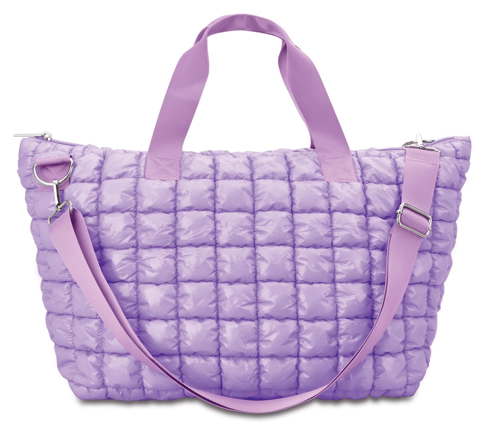 Purple quilted handbag with matching straps on a white background