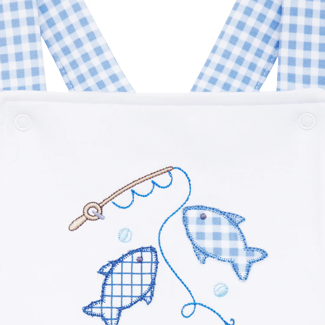 Embroidered design of a fish, fishing rod, and checkered fabric on a white background