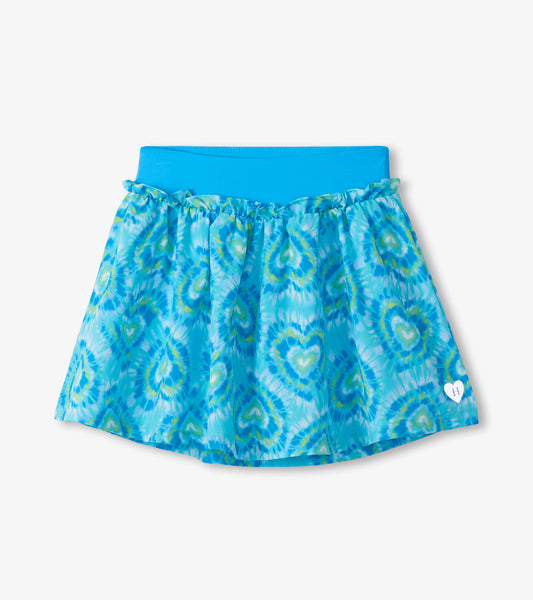 Blue tie-dye skirt with a heart pattern on a white background