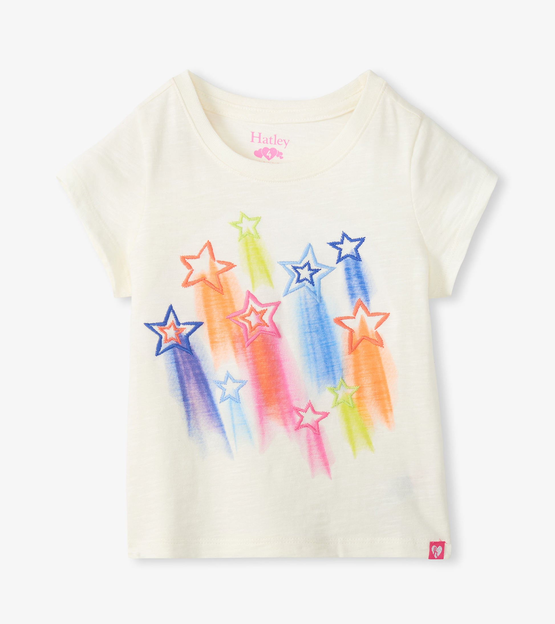 White t-shirt with colorful star designs on a white background