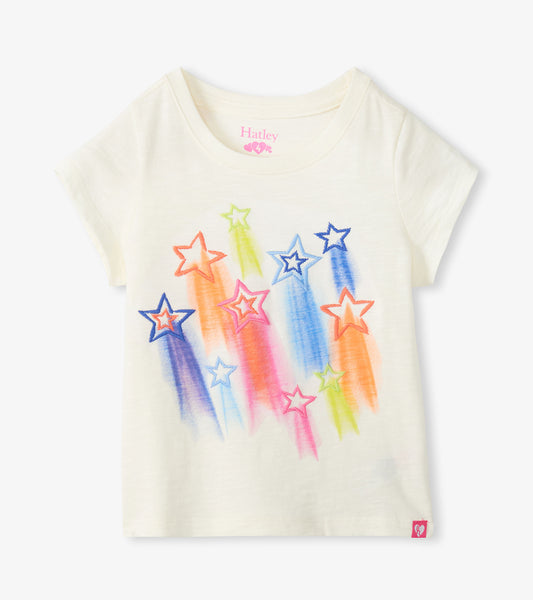 White t-shirt with colorful star designs on a white background