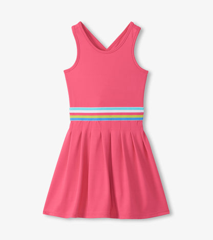 Pink dress with a colorful striped waistband on a white background