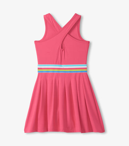 Pink dress with a rainbow band on a white background