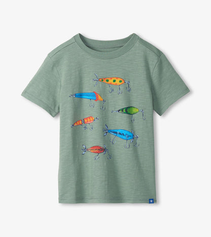 Green t-shirt with colorful fishing lure designs on a white background