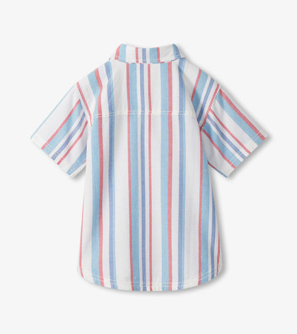 Striped shirt with red, blue, and white pattern on a white background